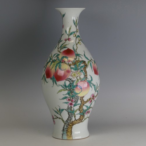 138A - A Chinese famille rose peaches Baluster Vase, well enamelled with peaches and peach blossom, apocryp... 