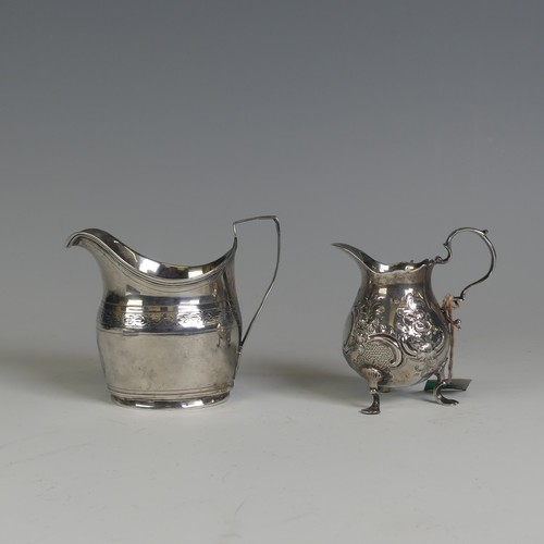 37 - A mid 18thC silver Cream Jug, marks rubbed, with foliate decoration, 9.5cm high, together with ... 