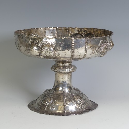 28 - An early 20thC German (800) silver Fruit Bowl, of shaped circular form raised on pedestal foot, the ... 