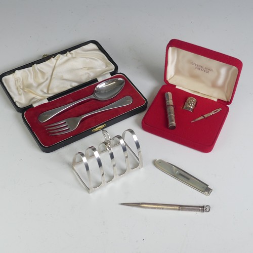 19 - A cased Elizabeth II silver presentation Sewing Set, by James Swann & Son, hallmarked Birmingham... 