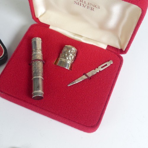 19 - A cased Elizabeth II silver presentation Sewing Set, by James Swann & Son, hallmarked Birmingham... 