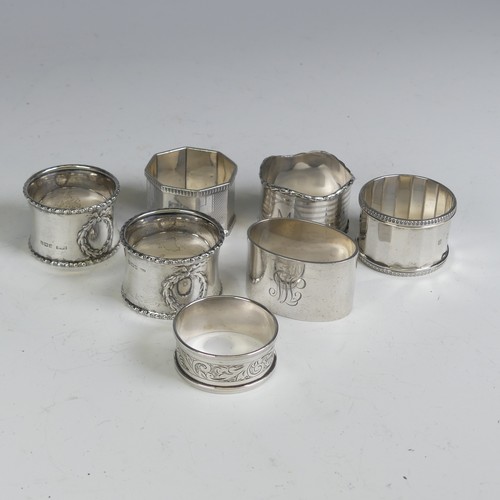 16 - A pair of George V silver Napkin Rings, hallmarked Birmingham 1923, with vacant laurel wreath cartou... 