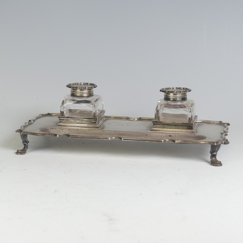 1 - An Edwardian silver Inkstand, by Elkington & Co Ltd., hallmarked London, 1909, with a pair of si... 