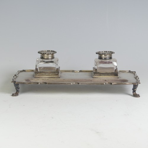 1 - An Edwardian silver Inkstand, by Elkington & Co Ltd., hallmarked London, 1909, with a pair of si... 