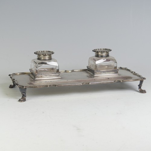 1 - An Edwardian silver Inkstand, by Elkington & Co Ltd., hallmarked London, 1909, with a pair of si... 