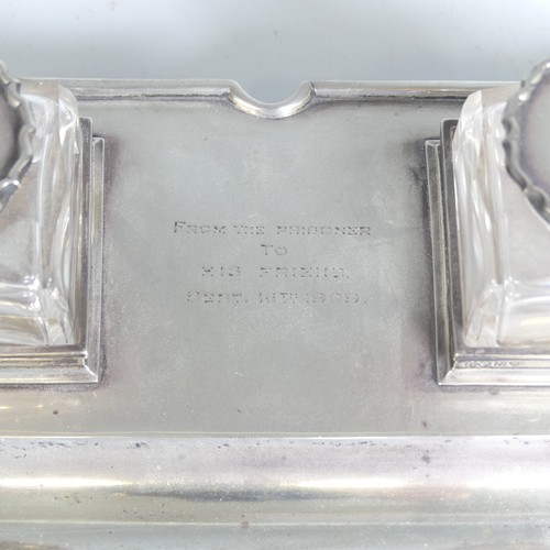 1 - An Edwardian silver Inkstand, by Elkington & Co Ltd., hallmarked London, 1909, with a pair of si... 