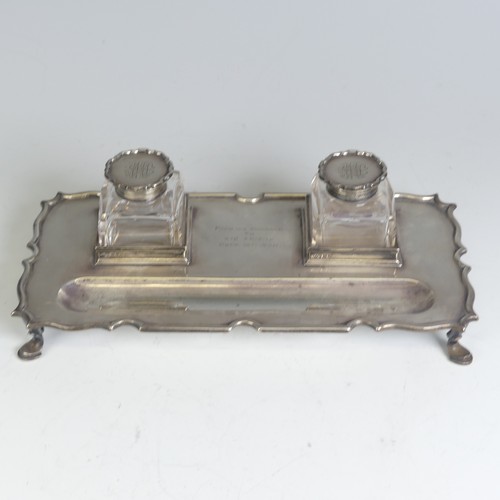 1 - An Edwardian silver Inkstand, by Elkington & Co Ltd., hallmarked London, 1909, with a pair of si... 