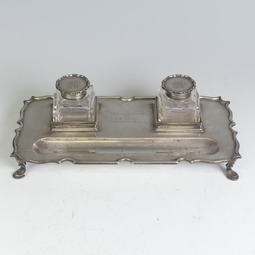 1 - An Edwardian silver Inkstand, by Elkington & Co Ltd., hallmarked London, 1909, with a pair of si... 