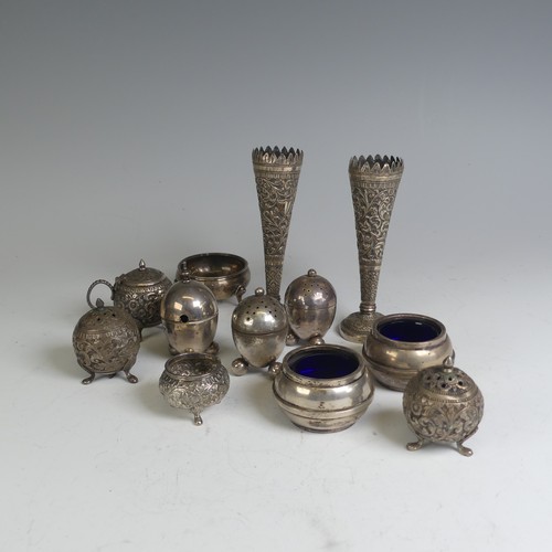 53 - A pair of Indian silver Spill Vases, with foliate decoration, 13cm high, together with a quantity of... 