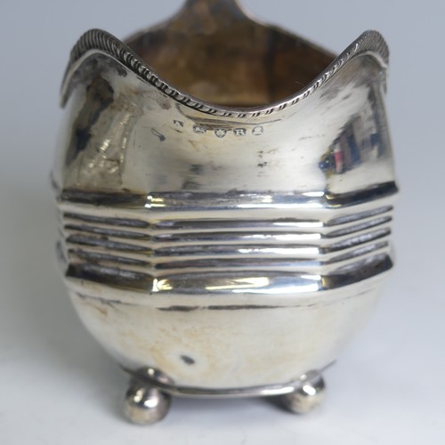 78 - A George III silver Cream Jug, hallmarked London 1812, crested, poor condition, together with an Edw... 