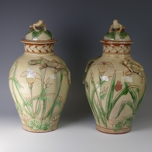 2 - Edwin Beer Fishley (1832-1912) a pair of Fremington Pottery Lidded Jars, each decorated in slipware ... 