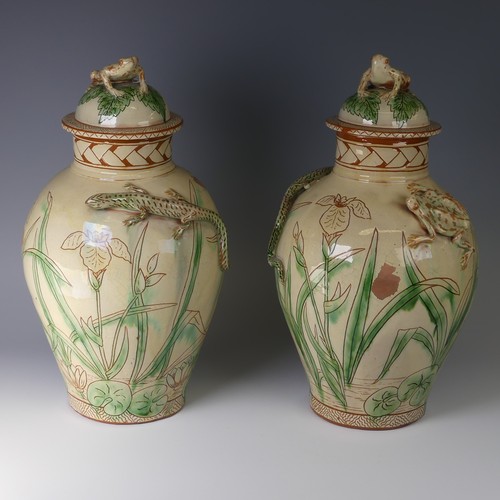 2 - Edwin Beer Fishley (1832-1912) a pair of Fremington Pottery Lidded Jars, each decorated in slipware ... 