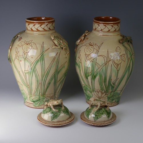 2 - Edwin Beer Fishley (1832-1912) a pair of Fremington Pottery Lidded Jars, each decorated in slipware ... 