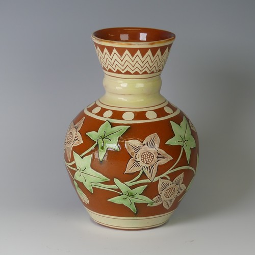 6 - Edwin Beer Fishley (1832-1912) a Fremington Pottery Vase, decorated in slips of flora, restoration t... 