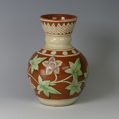 6 - Edwin Beer Fishley (1832-1912) a Fremington Pottery Vase, decorated in slips of flora, restoration t... 