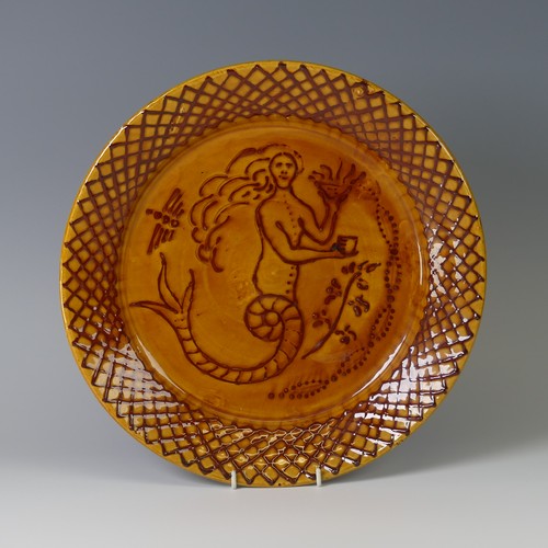 38 - William Fishley Holland (1888-1971) a Clevedon Pottery Charger, decorated in slip with a mermaid wit... 