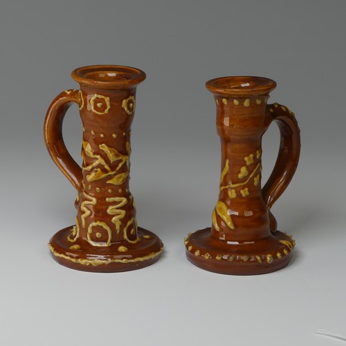 9 - Edwin Beer Fishley (1832-1912) two Fremington Pottery Candlesticks, in Wrotham style with brown grou... 