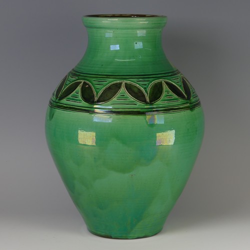 44 - William Fishley Holland (1888-1971) a large pottery Vase, of green ground with incised decoration, l... 