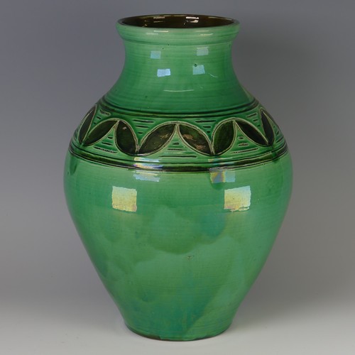 44 - William Fishley Holland (1888-1971) a large pottery Vase, of green ground with incised decoration, l... 