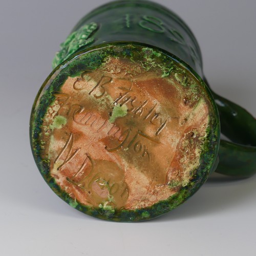 15 - Edwin Beer Fishley (1832-1912) a Fremington pottery Commemorative Mug, decorated with an applied cro... 