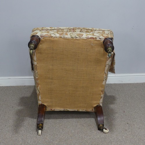 503 - A Victorian mahogany wing Armchair, the upholstered back with lugged sides and outscrolled arms, rai... 