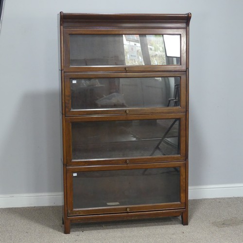 505 - An early 20th century mahogany four-tier Barristers Bookcase, having four glazed sliding doors, rais... 