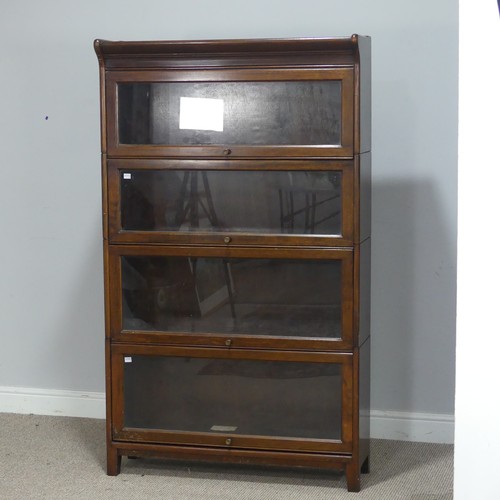 505 - An early 20th century mahogany four-tier Barristers Bookcase, having four glazed sliding doors, rais... 