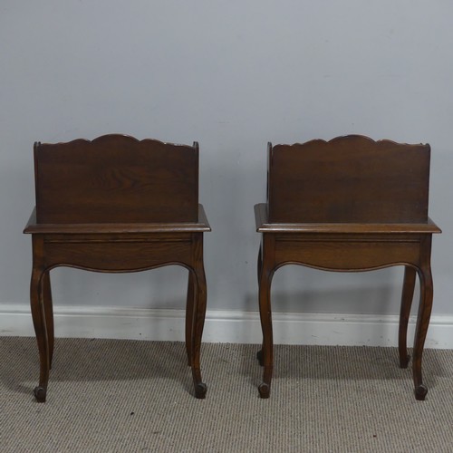 512 - A pair of 20th century French oak bedside Tables, with moulded top and shelves, over singular drawer... 