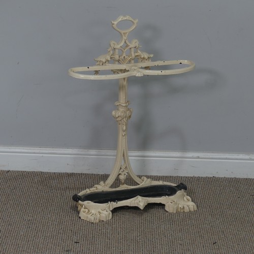 520 - A Victorian cast iron Coalbrookdale stick / umbrella Stand, the stand raised on leaf shaped feet to ... 