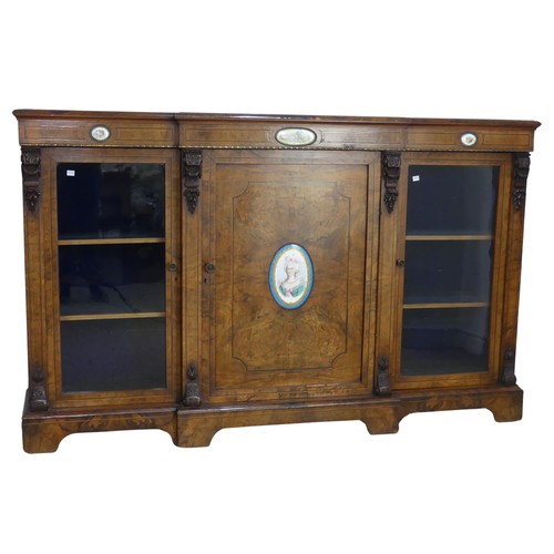 524 - A 19th century walnut veneered breakfront Credenza, the moulded top over frieze with ebony and walnu... 