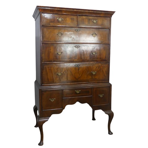 525 - A Georgian mahogany Chest on stand, moulded cornice over two short drawers and three long drawers, a... 