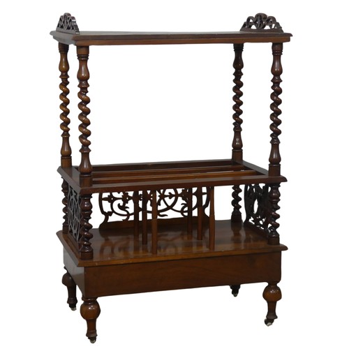 529 - A Victorian walnut Canterbury/Etagere, top raised on twisted supports and under tier, upon turned le... 