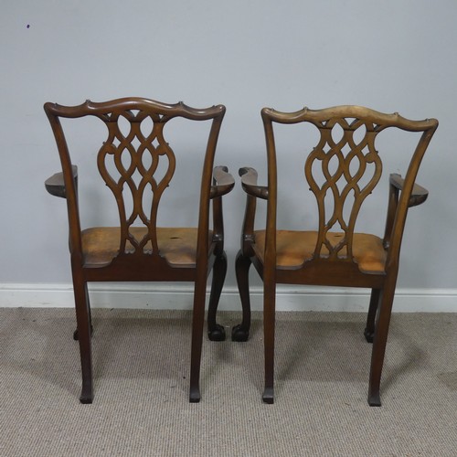 534 - A pair of Georgian mahogany Chippendale style Armchairs, shaped headrests over pierced splat backs, ... 