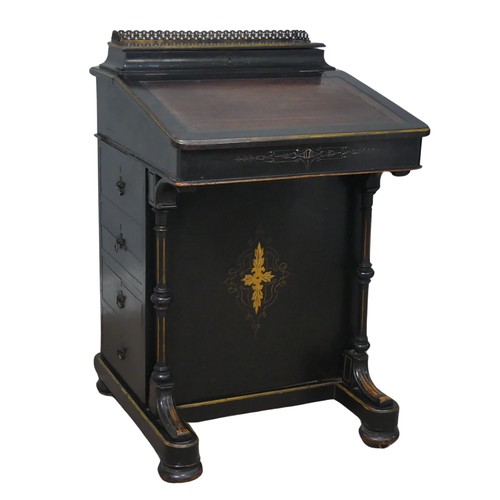 536 - An ebonised Victorian Davenport, the top with three quarter brass gallery and red painted writing su... 