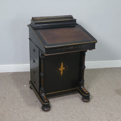 536 - An ebonised Victorian Davenport, the top with three quarter brass gallery and red painted writing su... 