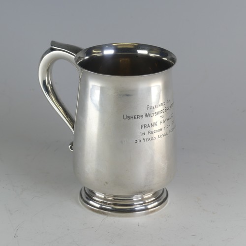 110 - An Elizabeth II silver Mug, by Elkington & Co Ltd., hallmarked Birmingham 1959, with scroll... 