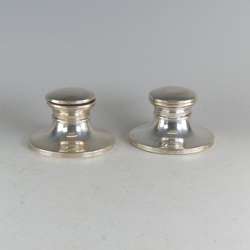 112 - A near pair of Elizabeth II silver capstan Inkwells, by W I Broadway & Co., hallmarked Birmingha... 