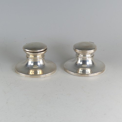 112 - A near pair of Elizabeth II silver capstan Inkwells, by W I Broadway & Co., hallmarked Birmingha... 