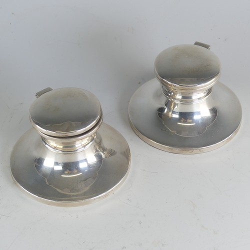 112 - A near pair of Elizabeth II silver capstan Inkwells, by W I Broadway & Co., hallmarked Birmingha... 