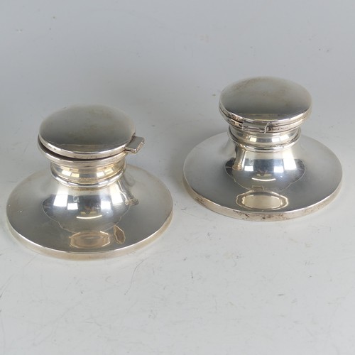 112 - A near pair of Elizabeth II silver capstan Inkwells, by W I Broadway & Co., hallmarked Birmingha... 