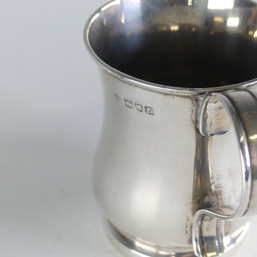 117 - An Edwardian silver Mug, by Horace Woodward & Co Ltd., hallmarked London, 1901, of plain baluste... 