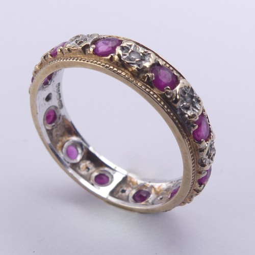 179 - A ruby and diamond full Eternity Ring, mounted in 9ct yellow and white gold, 4.75mm wide, Size N, ap... 