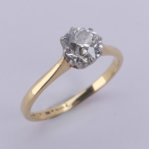 180 - A diamond solitaire Ring, the circular stone approx. 0.7ct, claw set in 18ct yellow gold and platinu... 