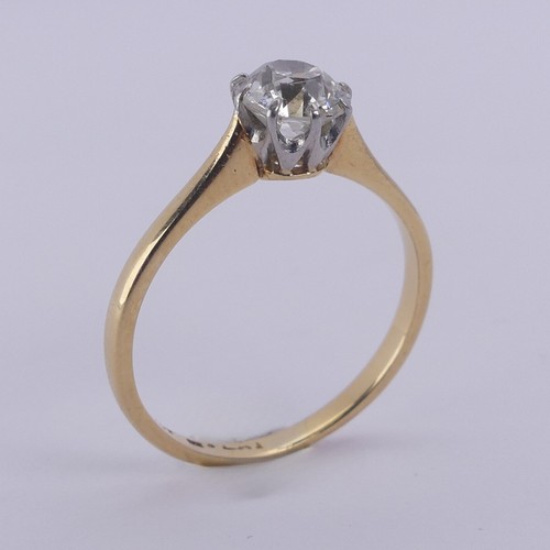 180 - A diamond solitaire Ring, the circular stone approx. 0.7ct, claw set in 18ct yellow gold and platinu... 