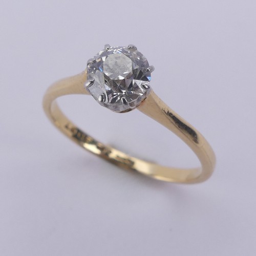 180 - A diamond solitaire Ring, the circular stone approx. 0.7ct, claw set in 18ct yellow gold and platinu... 