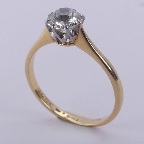 180 - A diamond solitaire Ring, the circular stone approx. 0.7ct, claw set in 18ct yellow gold and platinu... 