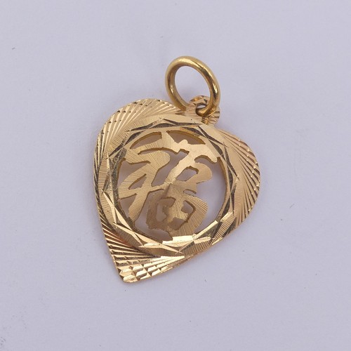 243 - A Chinese gold heart shaped Pendant, pierced with character marks, marked on the reverse, tested as ... 