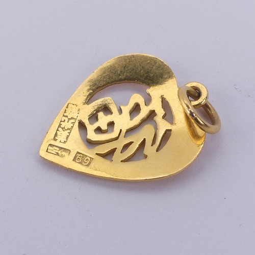 243 - A Chinese gold heart shaped Pendant, pierced with character marks, marked on the reverse, tested as ... 