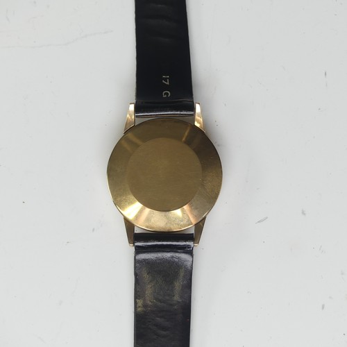 146 - A vintage 9ct gold Tudor Wristwatch, the signed silvered dial with gilt Arabic numerals and hands an... 