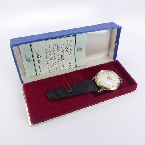 147 - A vintage 18ct yellow gold cased Zodiac Calendar Wristwatch, the silvered dial with gilt batons and ... 